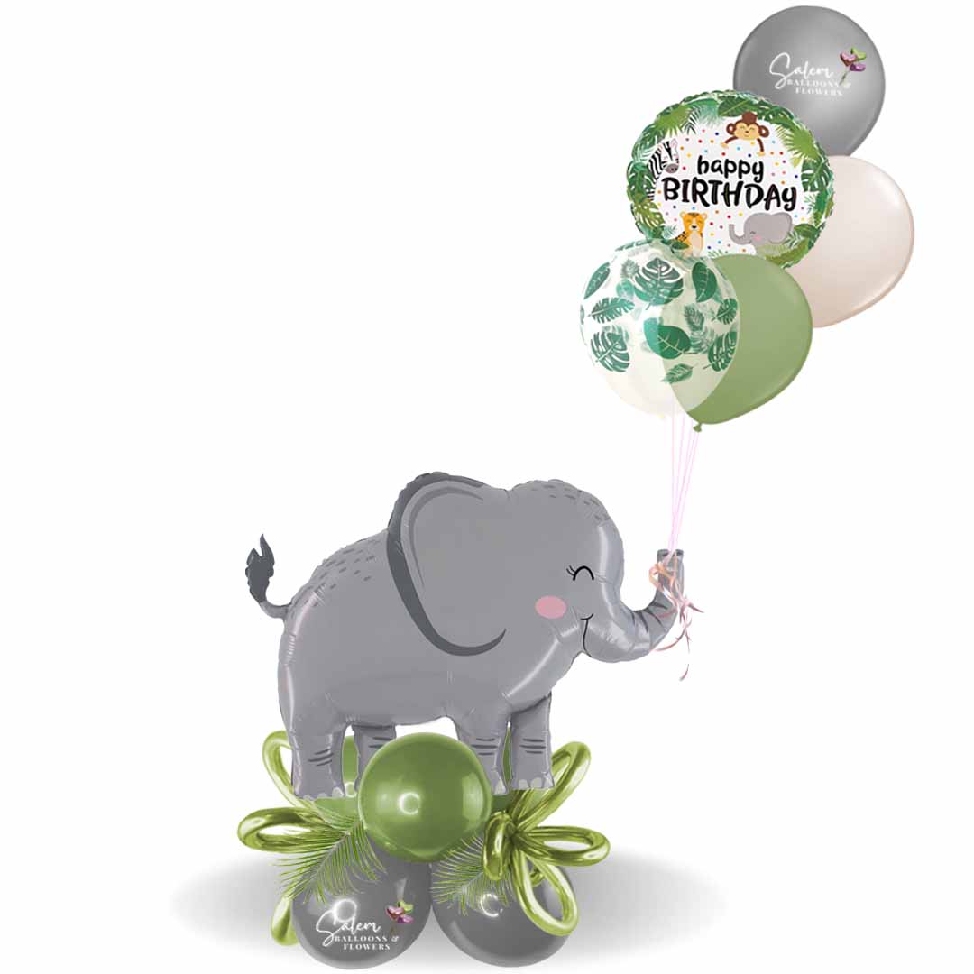 Safari themed balloon boquet featuring an elephan balloon and a set of helium filled balloons with a happy birthday message. Balloons salem oregon and nearby cities.