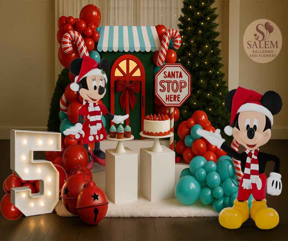 Decorative setup with balloon garlands, Mickey Mouse balloons and festive sculptures in a room with a Christmas tree. Balloon decor. Oregon.