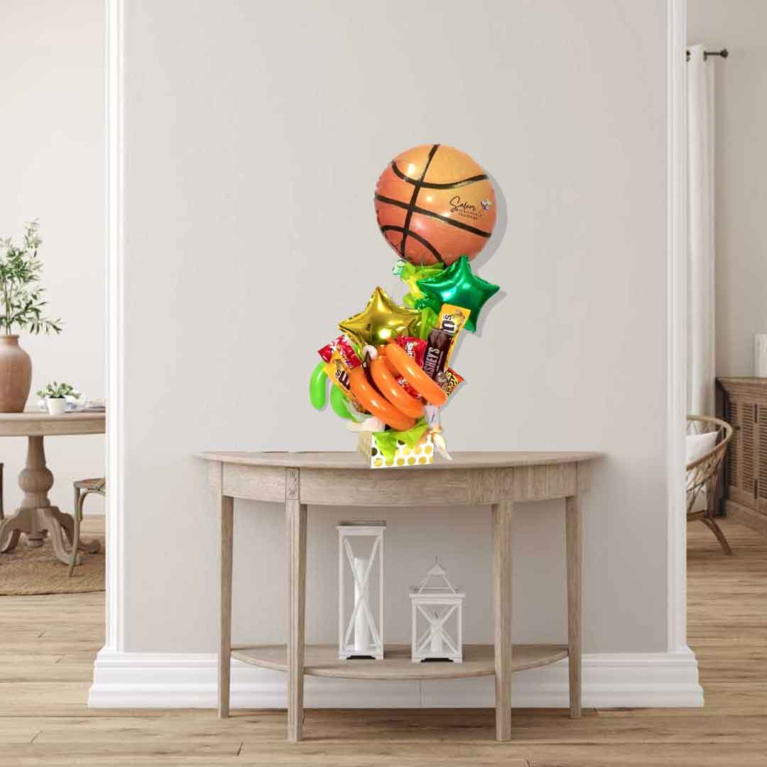 Sports themed candy balloon bouquet. Featuring a sport ball. Basketball balloon.Delivery in Salem OR and nearby cities..Size chart