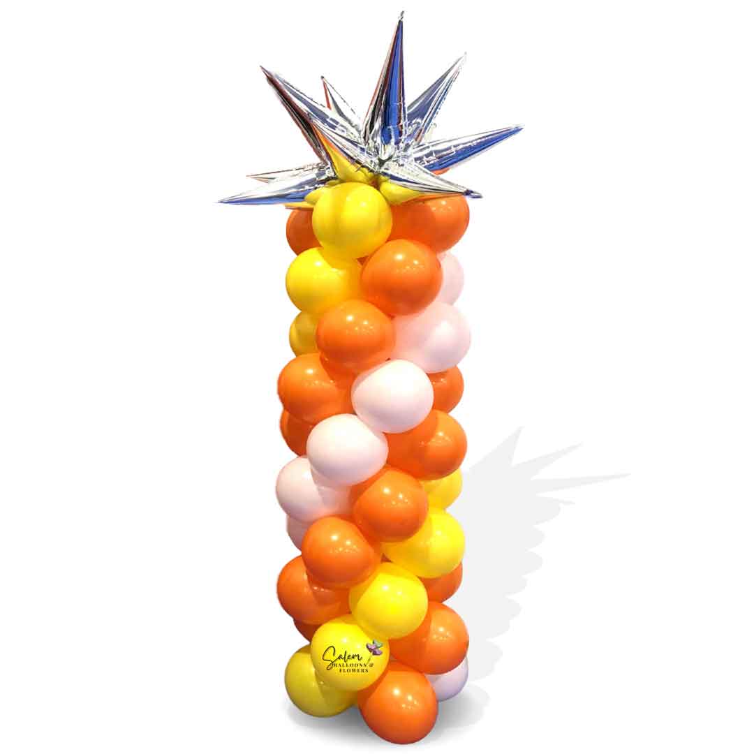 Classic balloon column with a silver starburst balloon topper. The body of the balloon column comes in a swirl of colors. Salem Oregon Balloon decorations.