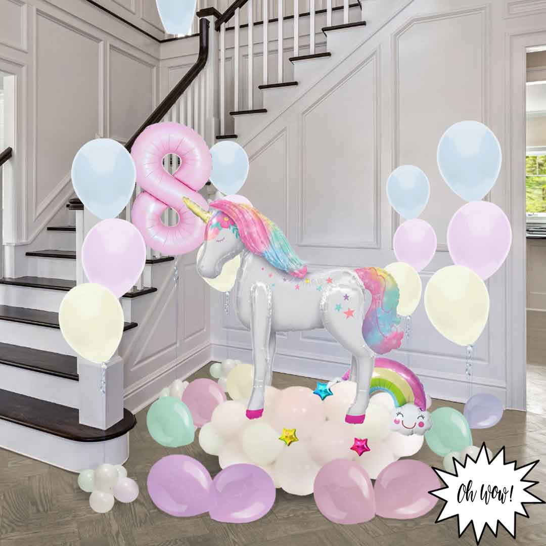 Unicorn themed balloon decoration, with helium balloons and an extra large balloon unicorn, balloon number. Salem Oregon balloon decor.