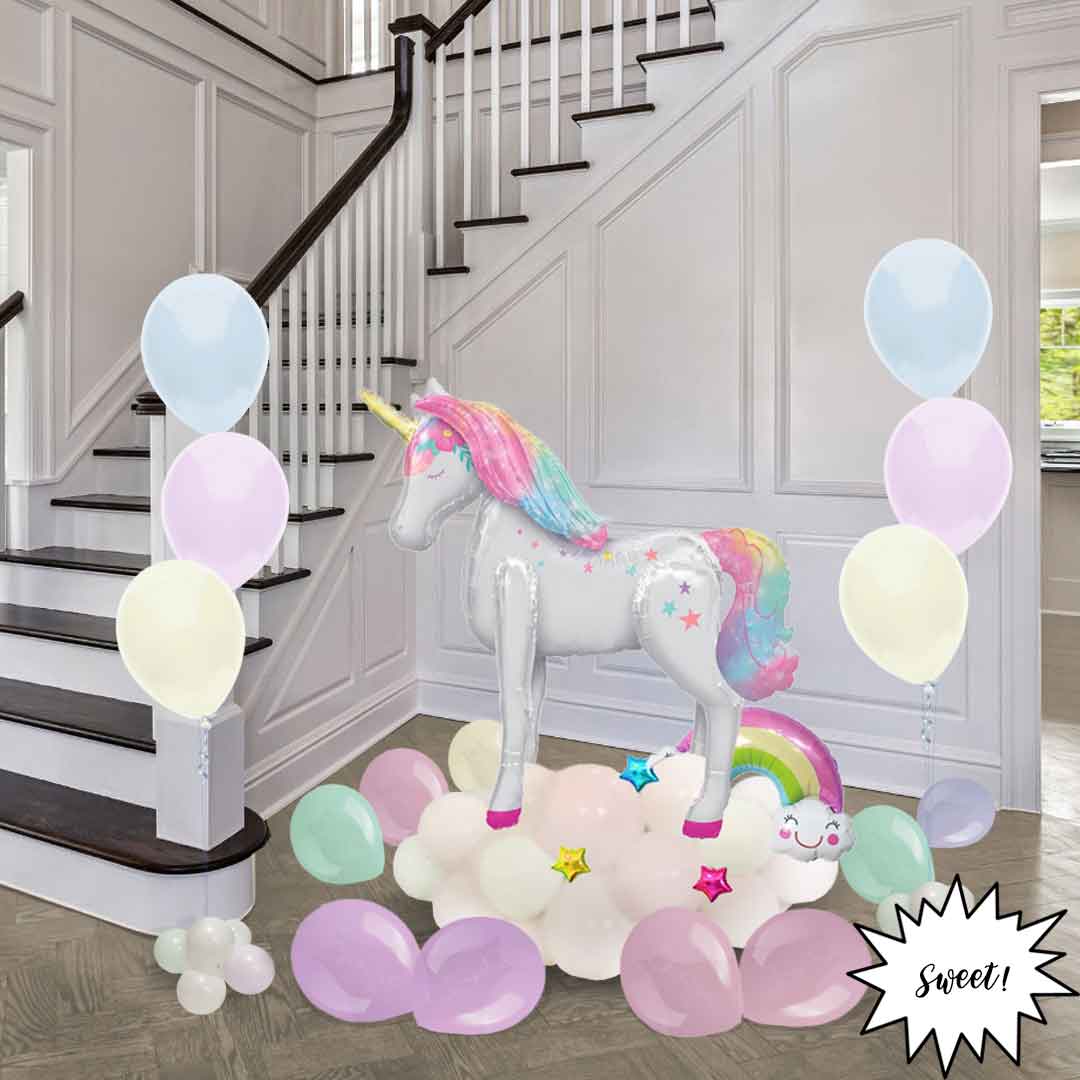 Unicorn themed balloon decoration, with helium balloons and an extra large balloon unicorn. Salem Oregon balloon decor.