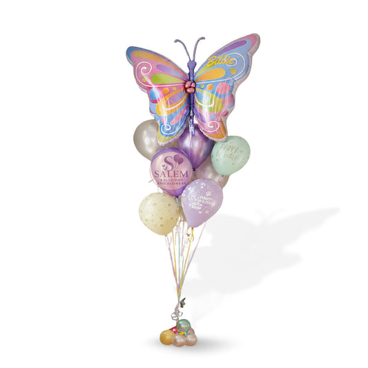 A whimsical pastel butterfly birthday balloon bouquet displayed on a white background with a Salem Balloons and Flowers logo. Balloon delivery Willamette Valley.