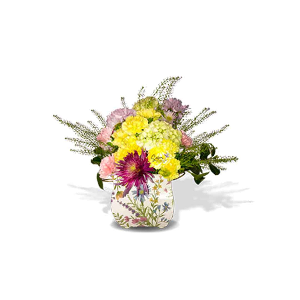 Fresh flowers arranged in a small square flower vase in pastel colors and decorated with a bird figurine. Salem Oregon Flower delivery