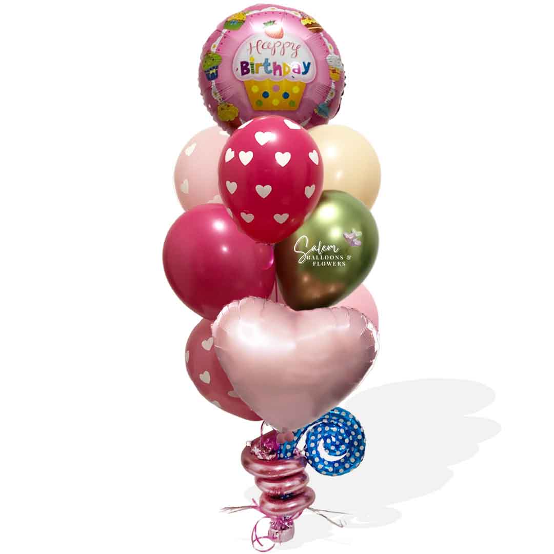 A cupcake themed helium filled balloon bouquet in pink and green colors. Birthday balloon delivery Salem Oregon and nearby cities.