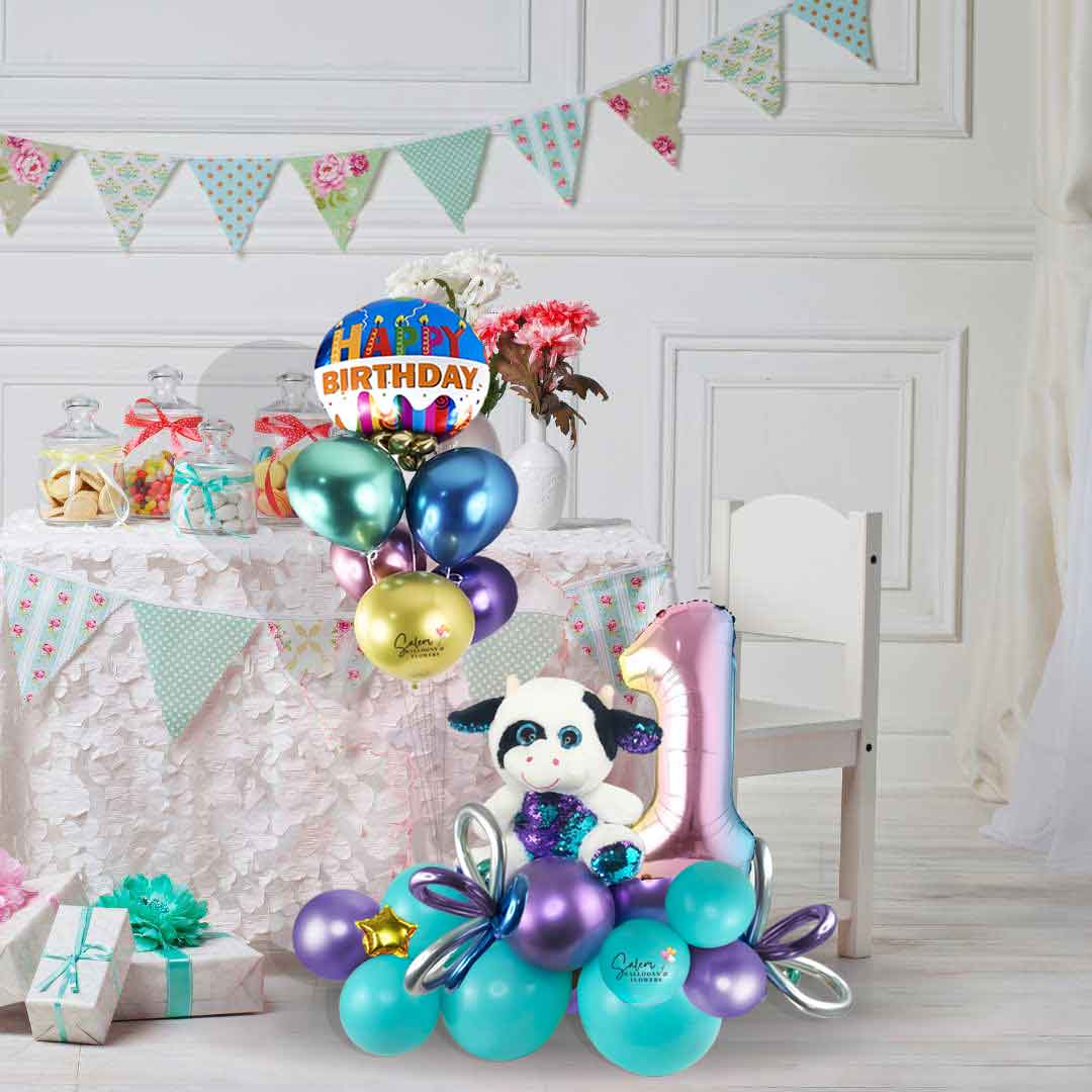 Happy Birthday Balloon bouquet with plush. Featuring a funny wow plush decorated with blue and purple shinny sequins holding a set of helium filled balloons. Salem oregon balloon delivery