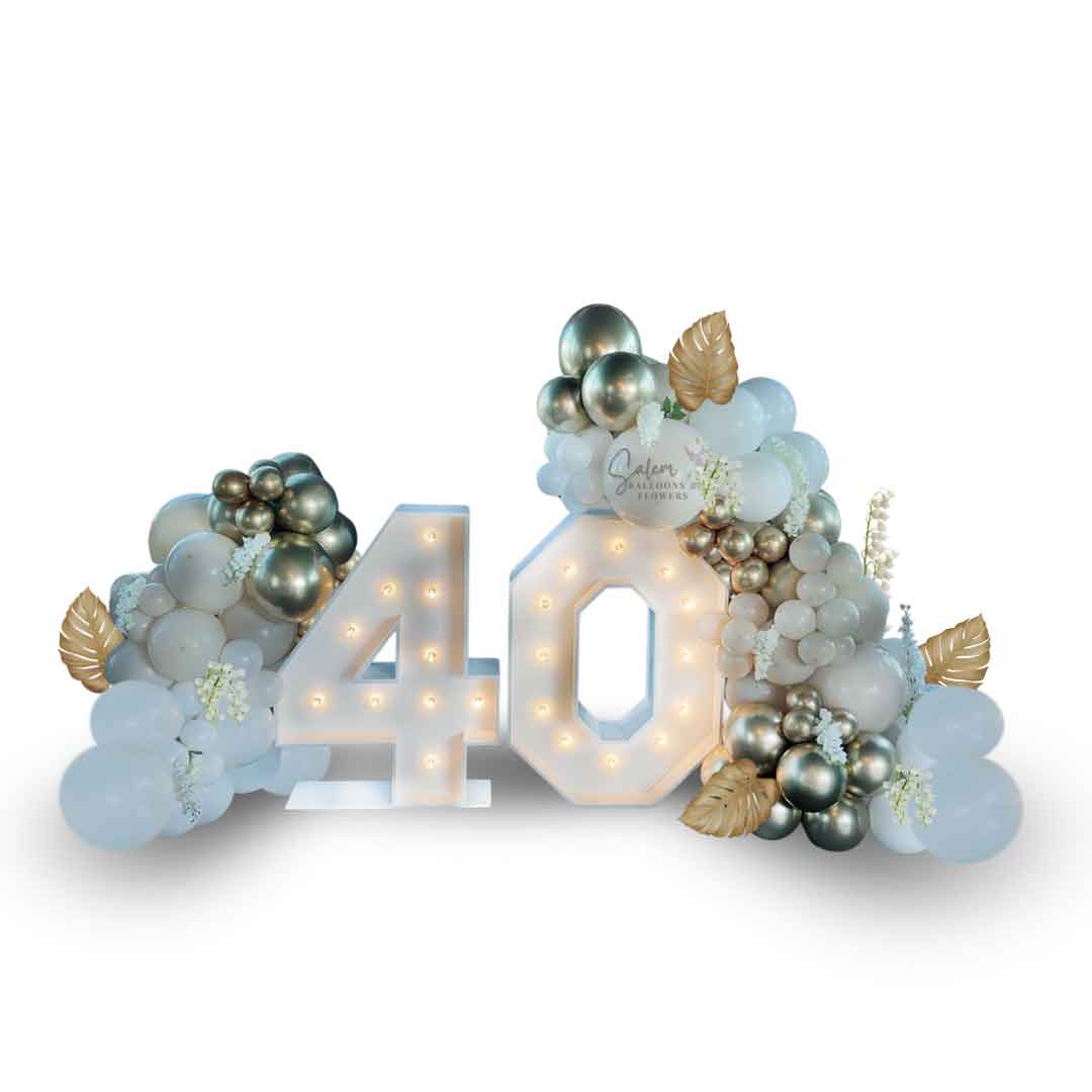 Decorative number '40' Marquee Numbers and balloons and flowers on a white background. Party rentals Oregon.