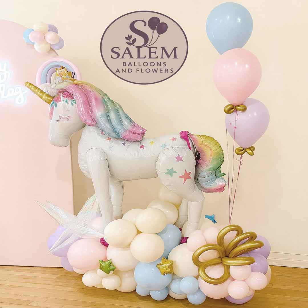 Mega balloon arrangement. Unicorn in pastel colors with a rainbow and helium balloons. Balloon decor. Oregon