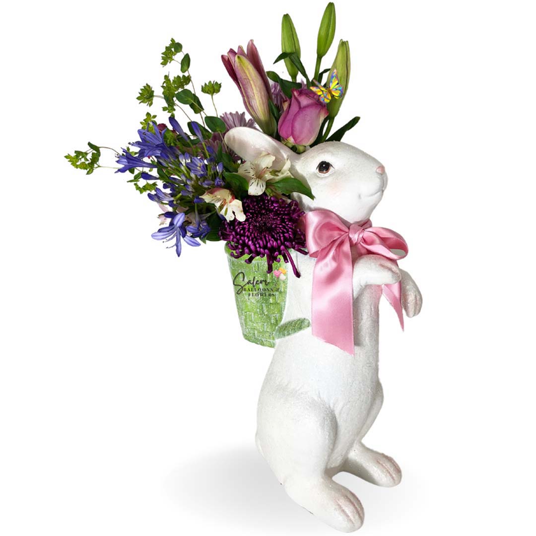 Spring flower arrangement in a large white bunny vase. Flower delivery in Salem OR and nearby cities.