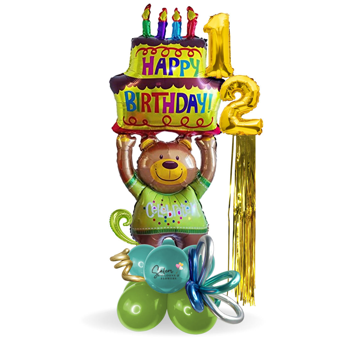 Numbers balloon bouquet a gift that never goes out of style. Featuring an extra large teddy bear balloon wearing a T-shirt with the word "Celebrate" as he carries a huge cake with a "Happy Birthday" phrase. Delivery Balloons Salem Oregon and nearby cities.