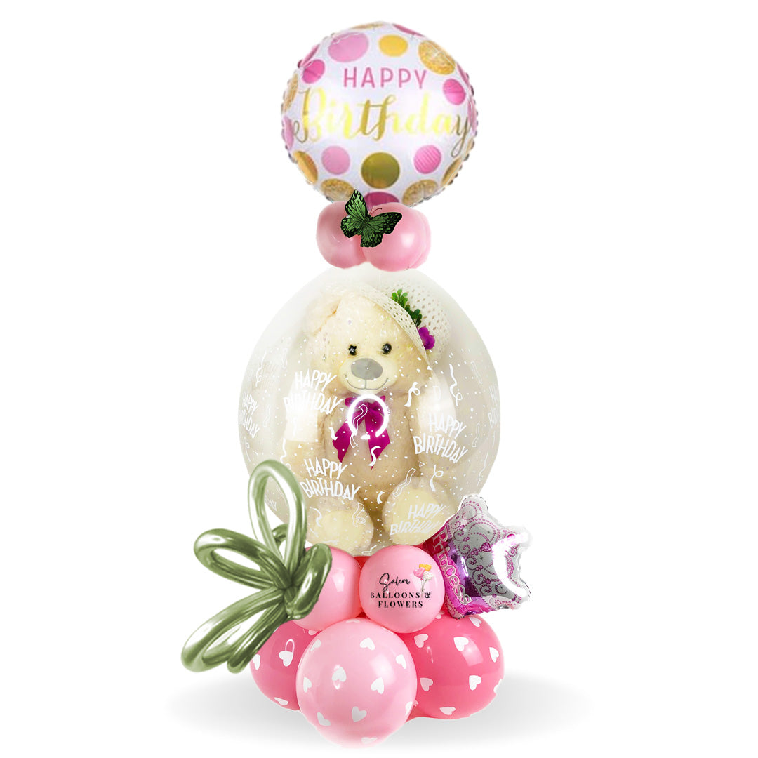 HBD Stuffed Balloon Bouquet. Birthday balloon bouquet, featuring a cute plush wearing a fancy hat. Clear stuffed balloon comes with 