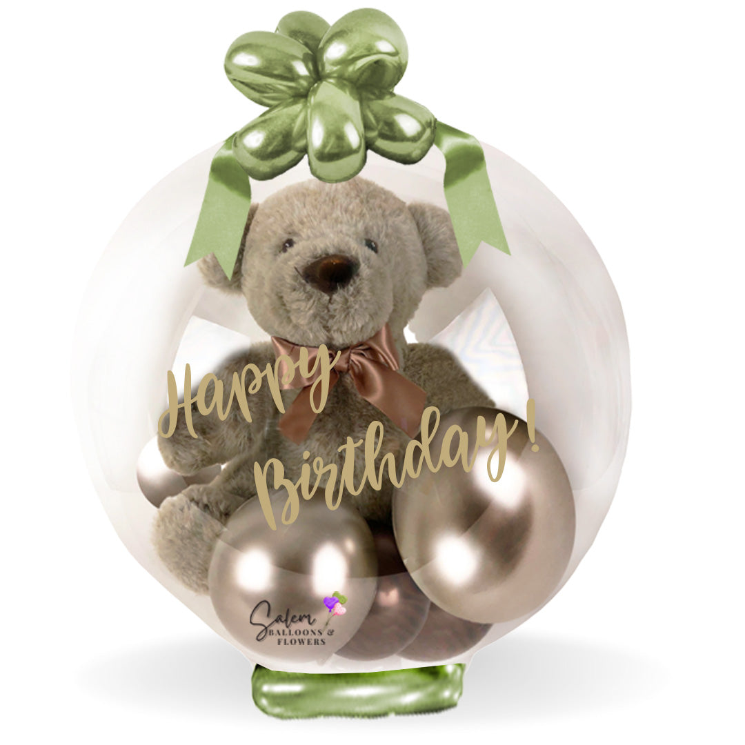 Happy birthday stuffed balloon bouquet. Featuring a teddy bear stuffed in a bubble balloon. Balloons salem Oregon and nearby cities.
