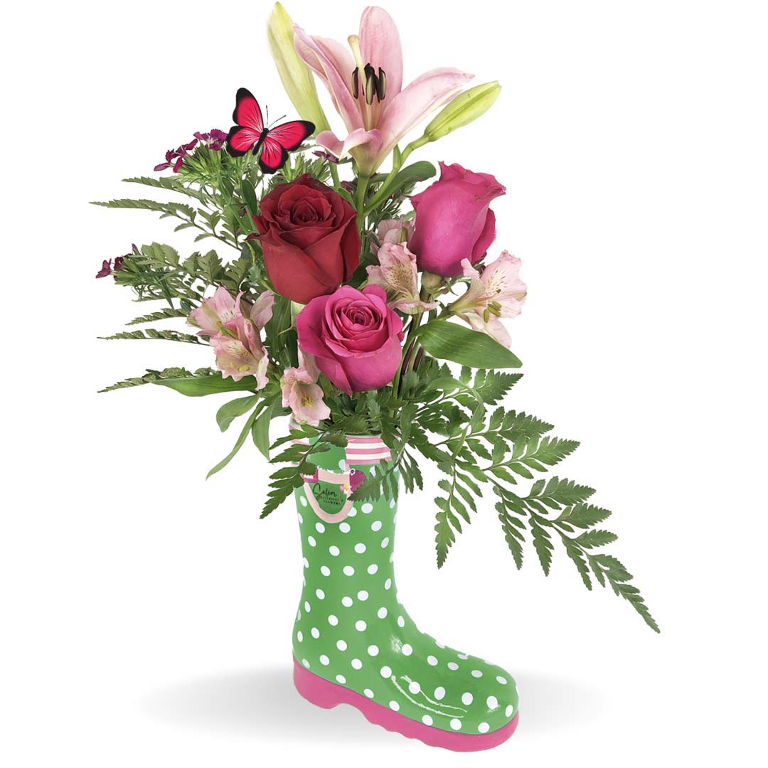 Colorful and amused flower bouquet. Featuring a cute polka-dots boot shaped ceramic  vase. Available in pink, blue and green. Free delivery in Salem Oregon and nearby areas. 