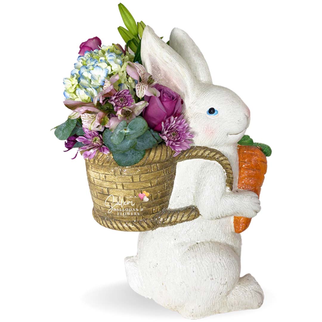 Spring flower arrangement in a large white bunny vase. Flower delivery in Salem Oregon and nearby cities.