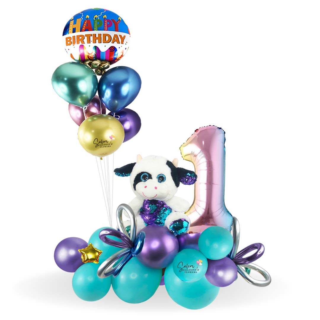 Happy Birthday Balloon bouquet with plush. Featuring a funny wow plush decorated with blue and purple shinny sequins holding  a set of helium filled balloons.