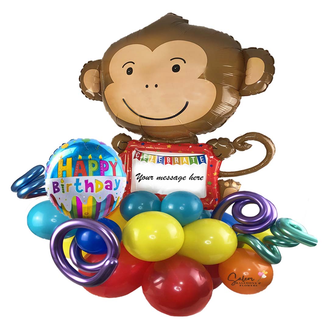 Large Balloon Bouquet. Whit colorful balloons, featuring a Monkey balloon with a whiteboard ready for you to write your message. Deluxe style comes with a set of colorful polka-dots helium balloons. Free delivery in Salem Oregon and nearby areas.
